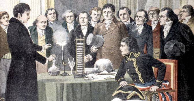 . Alessandro Volta spiega il funzionamento della sua invenzione, la pila, davanti a Napoleone Bonaparte e a un consesso di colleghi nel 1801