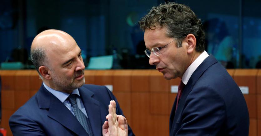 Pierre Moscovici e Jeroen Dijsselbloem (Reuters)
