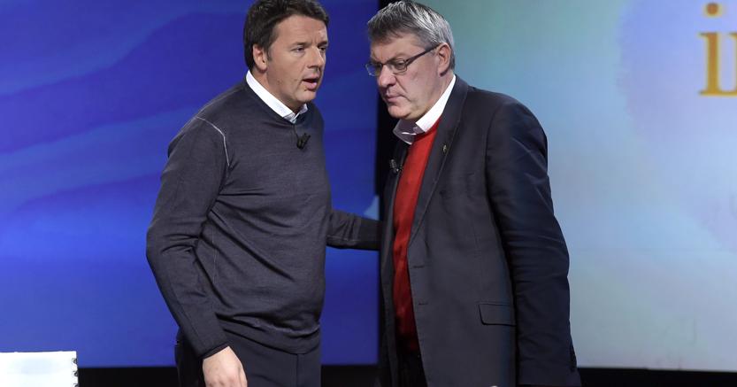 Matteo Renzi e Maurizio Landini durante la puntata della trasmissione televisiva “in 1/2 ora”. (Ansa)