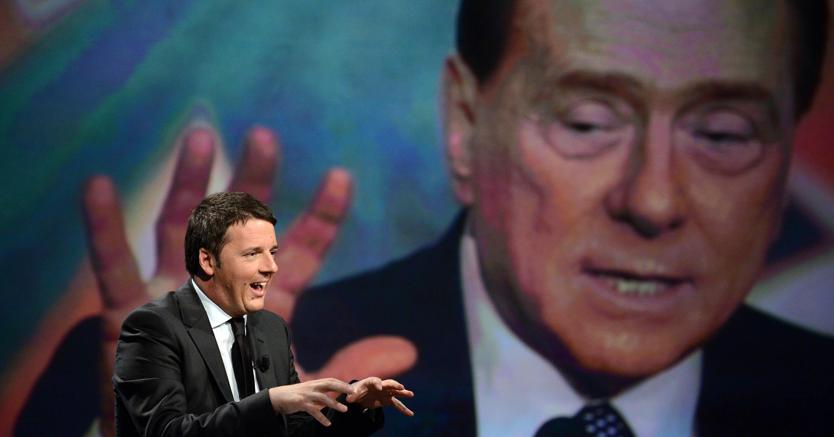 號稱新政治代表的第56任義大利總理馬泰奧‧倫齊（前），與貪腐的象徵西爾維奧‧貝魯斯柯尼（後），以迅雷不及掩耳的速度瞬間合體。