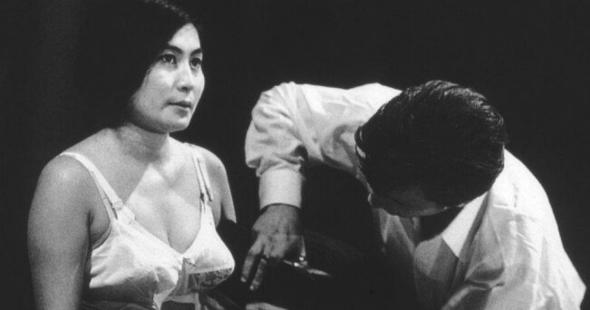 Yoko Ono, Cut Piece, 1964_Performed by Yoko Ono, Carnegie Recital Hall, New York, March 21, 1965_Minoru Niizuma_Courtesy Lenono Photo Archive, New York