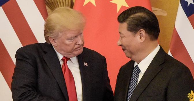 Il presidente degli Stati Uniti Donald Trump con il presidente cinese Xi Jinping (Afp) 