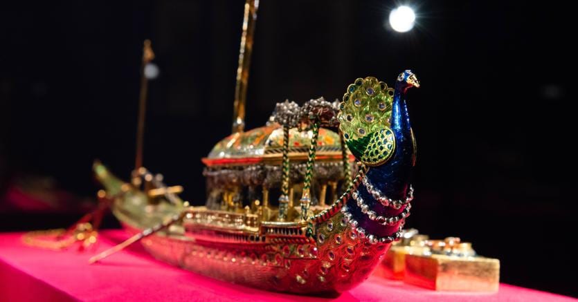 A gold enamelled and diamond-set peacock ink stand in the form of a State Barge, that is formed of 19 pieces, including a penknife, inkwells and a pair of scissors. Credit line: Royal Collection Trust /© Her Majesty Queen Elizabeth II 2018