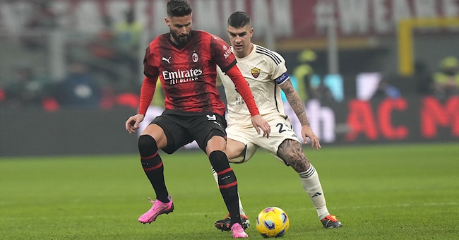  Olivier Giroud (Milan) e a destra Gianluca Mancini (Roma) durante la partita allo stadio San Siro di Milano del 14 gennaio. (Foto AP)