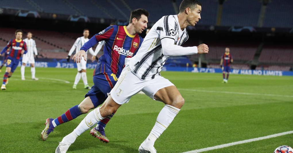 Camp Nou, match di Champions dell’8 dicembre 2020  tra Barcellona e Juventus. Nella foto Cristiano Ronaldo e Lionel Messi (Reuters) 
