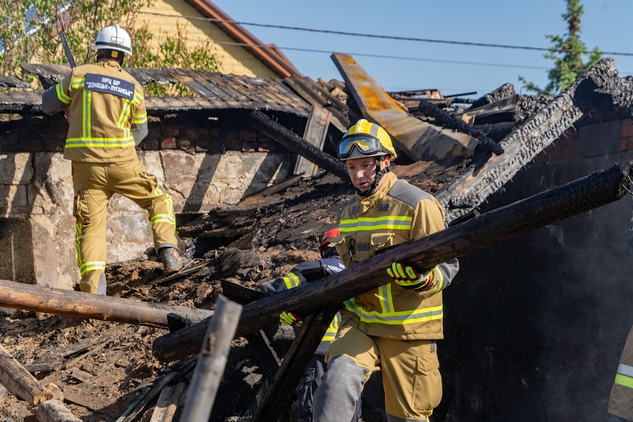 Rescuers clear the rubble of private house after a Russian air attack in Kharkiv, Ukraine, Tuesday, May 19, 2026. (AP Photo/Andrii Marienko) (Apn)