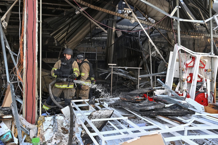 Firefighters work at the site of a shopping mall hit during an overnight Russian drone strike, amid Russia's attack on Ukraine, in Zaporizhzhia, Ukraine October 26, 2026. REUTERS/Stringer (REUTERS)