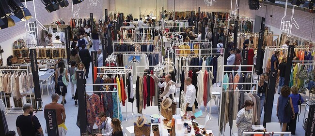 Shows are just the beginning. During September fashion week the White and Super trade fairs in Milan's Tortona district are equally important events for international buyers on the hunt for emerging brands from Italy and elsewhere; alongside, a scene from the Pitti Immagine event in September 2018 