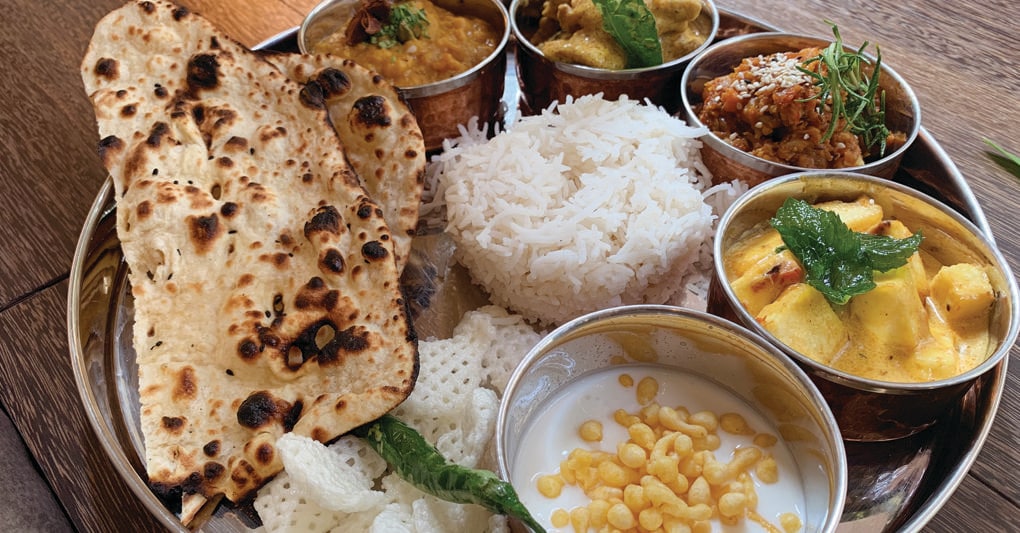 Il thali, protagonista del  menu Diwali, della chef indiana Ritu Dalmia, anche in variante vegetariana 