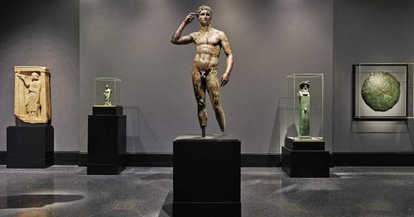 View of a newly reinstalled collection gallery at the Getty Villa. Center: Statue of a Victorious Youth, unknown, 300–100 BCE. Bronze. The J. Paul Getty Museum