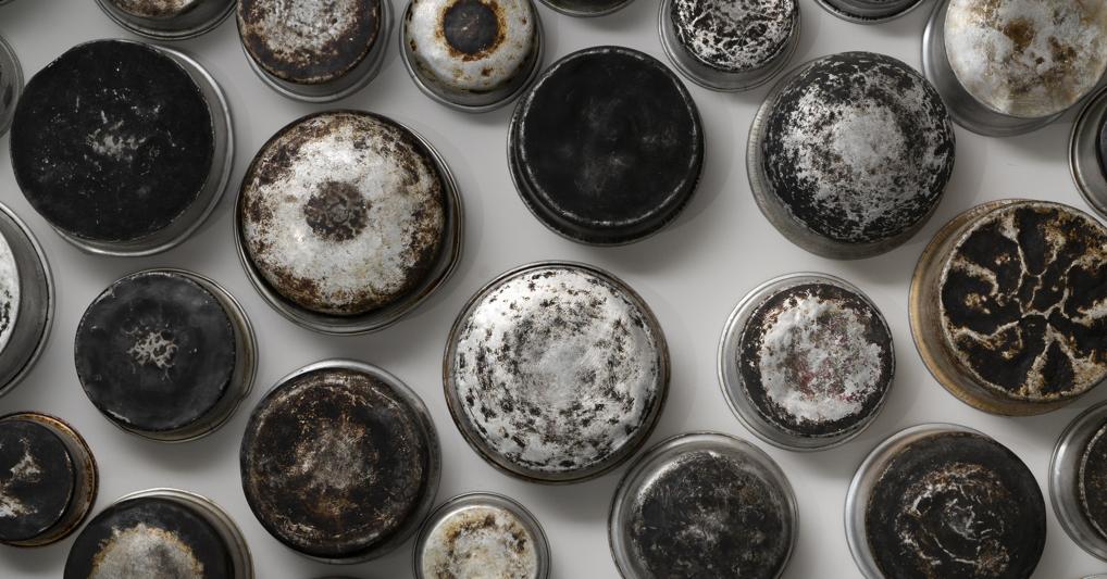 Maha Malluh, Food for Thought “Al Muallaqat 5””, 2017, Installation of 53 used aluminum small pots, Photo by Mohammed Al Shebli, Courtesy the artist and Basma AlSulaiman 