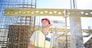 Construction worker looking at construction site
