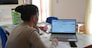 Una commercialista prepara da casa un documento fiscale per un'azienda cliente, Roma, 29 maggio 2023. ANSA / CARMELA GIUDICE  (generica, simbolica, donna, lavoro, smart working, casa, remoto)