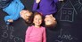Three cheerful children playing together
