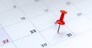 Red push pin on calendar 31st day of the month, new year eve