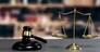 Shiny golden balanced scale and wooden gavel in law firm or lawyer office background as concept justice and a common legal symbol. Scale balance for righteous and equality judgment. Equilibrium
