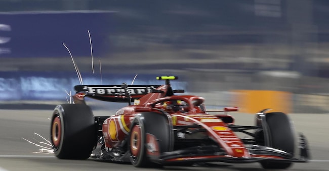 epa11172676 Scuderia Ferrari driver Carlos Sainz Jr of Spain steers his car during the pre-season testing for the 2024 Formula One season at the Bahrain International Circuit in Sakhir, Bahrain, 22 February 2024.  EPA/ALI HAIDER