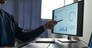Businessman analyzing financial data statistics on pc computer pointing at screen with graph Chart showing company growth using easy accounting software to plan. Management for start-up business.