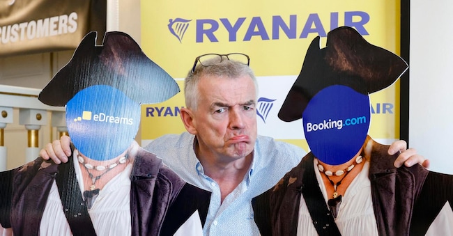 Ryanair group CEO Michael O'Leary poses for a photo between cardboard pirate silhouettes representing eDreams, Opodo, Booking and Agcm during the press conference on the online agencies affair and Ryanair 's alleged dominance in Italy, Rome 17 April 2024. ANSA/FABIO FRUSTACI