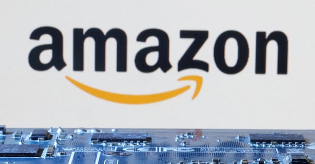 FILE PHOTO: Amazon logo is seen near computer motherboard in this illustration taken January 8, 2024. REUTERS/Dado Ruvic/Illustration/File Photo