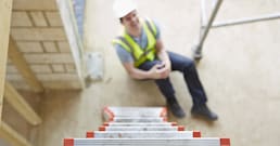 Construction Worker Falling Off Ladder And Injuring Leg