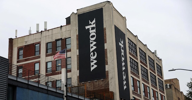 FILE PHOTO: A WeWork logo is seen outside its offices in the Queens borough of New York City, U.S., November 7, 2023. REUTERS/Shannon Stapleton/File Photo