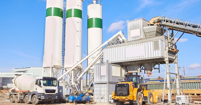Cement factory at sunny day. Industrial area