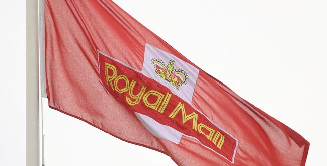 FILE PHOTO: A Royal Mail flag flies near a sorting office as workers strike, in west London, Britain, November 24, 2022. REUTERS/Toby Melville/File Photo