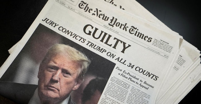 New York Times newspapers are being printed, following the announcement of the verdict on former U.S. President Donald Trump's criminal trial, over charges that he falsified business records to conceal money paid to silence adult film star Stormy Daniels in 2016, at the New York Times College Point Printing Plant in Queens, New York City, U.S. May 30, 2024. REUTERS/Stephani Spindel