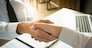 business negotiation in meeting hands shaking successful agreement