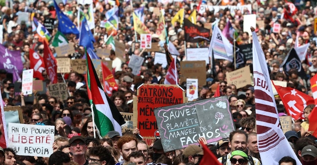 Demonstrators take part in an anti far-right rally after French president called legislative elections following far-right parties' significant gains in European Parliament elections, in Strasbourg, eastern France, on June 15, 2024. Less than a week after the earthquake of the dissolution, opponents of the far-right are called by trade unions, associations and the left-wing coalition of the "Nouveau Front Populaire" to take to the streets across France. (Photo by Frederick FLORIN / AFP)