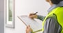 Building inspection, contractor asian young man, male inspecting home, reconstructed construction, renovation or check defect, before finish handing it over to client. Engineering worker, copy space.