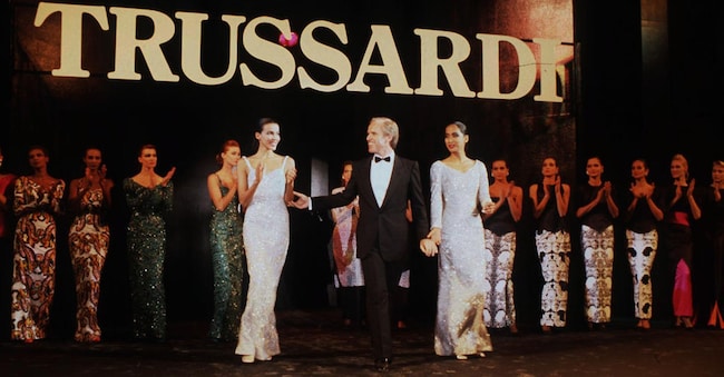 Italian fashion designer and entrepreneur Nicola Trussardi with fashion models at a fashion show, Milan, Italy, 25th March 1983. (Photo by Leonardo Cendamo/Getty Images)