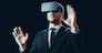 business, augmented reality and technology concept - businessman in virtual headset over black background