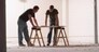 Men Going over Blueprints --- Image by © John Lund/CORBIS