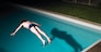 Man diving in swimming pool