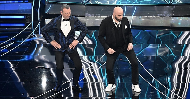 Amadeus e  John Travolta al 74° Festival della Canzone Italiana. (Agf) 