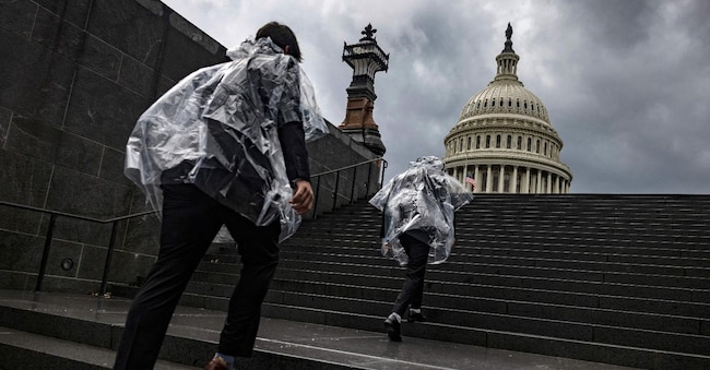 Visitors walk along the stairs from the Visitors Center towards the U.S. Capitol building (Photo by Samuel Corum / GETTY IMAGES NORTH AMERICA / Getty Images via AFP)