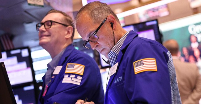 NEW YORK, NEW YORK - AUGUST 06: Traders work on the floor of the New York Stock Exchange during morning trading on August 06, 2024 in New York City. Stocks opened up slightly up in the three major indexes a day after the Dow Jones and the S & P 500 had their worst day of trading since 2022, amid a global market sell-off centered around fears of a U.S. recession. Michael M. Santiago/Getty Images/AFP (Photo by Michael M. Santiago / GETTY IMAGES NORTH AMERICA / Getty Images via AFP)