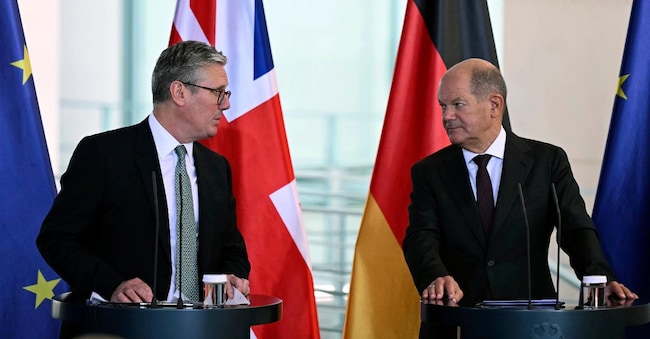 Britain's Prime Minister Keir Starmer, left, attends a joint news conference with German Chancellor Olaf Scholz, after talks at the Chancellery in Berlin, Wednesday Aug. 28, 2024. (Justin Tallis/Pool Photo via AP)