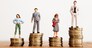 Conceptual image of gender inequality. A women and a men with income difference