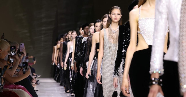 Models present creations by Giorgio Armani Prive during the Haute-Couture Fall/Winter 2024 show as part of the Paris Fashion Week in Paris, on June 25, 2024. (Photo by ALAIN JOCARD / AFP)