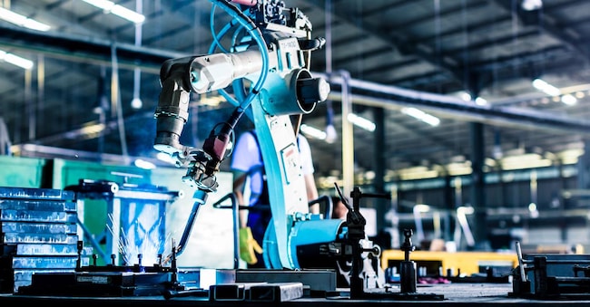 Welding robot in production plant or factory
