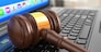 Online internet auction. Gavel on laptop.  3d