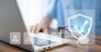 Health insurance, Doctor working in office at hospital and visual screen technology concept life insurance medical and heal care