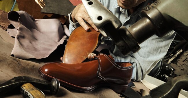 craftsman making luxury handmade man shoes