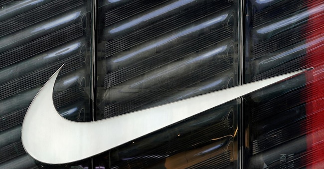 FILE PHOTO: The Nike swoosh logo is seen outside the store on 5th Ave in New York, New York, U.S., March 19, 2019.   REUTERS/Carlo Allegri/File Photo