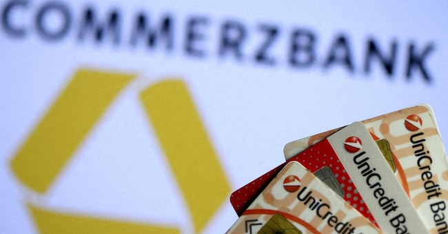 FILE PHOTO: Unicredit credit cards are seen in front of a displayed Commerzbank logo in this illustration taken September 20, 2017. REUTERS/Dado Ruvic/Illustration/File Photo