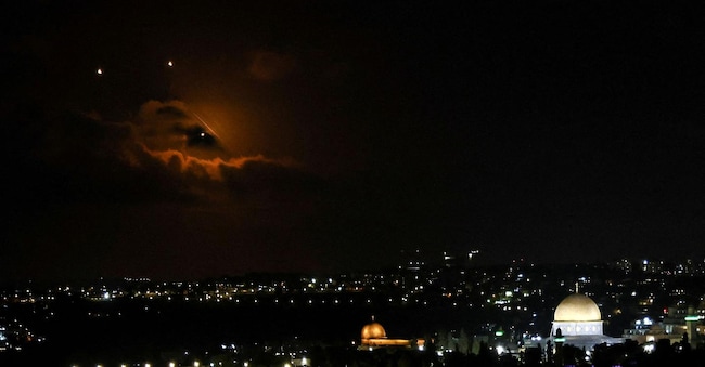 The Dome of the Rock on the Al-Aqsa compound, also known to Jews as the Temple Mount is seen as projectiles fly through the sky, after Iran fired a salvo of ballistic missiles at Israel, as seen from Jerusalem October 1, 2024. REUTERS/Jamal Awad     TPX IMAGES OF THE DAY