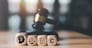 wooden blocks and Wooden judge gavel on the table, concept of copyright or intellectual property patent protection of copyright infringement proprietary declaration Legitimate innovations